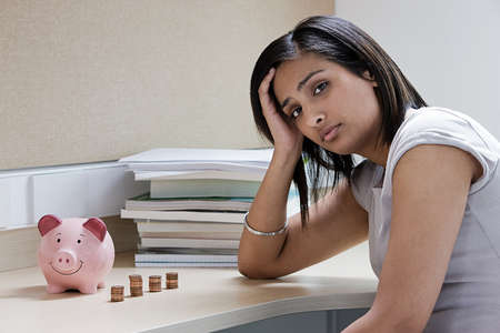 Woman at a desk worrying