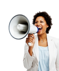Successful business woman with a megaphone on white