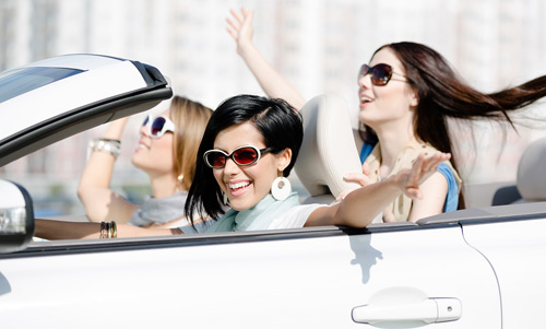 Women in convertible car cruising